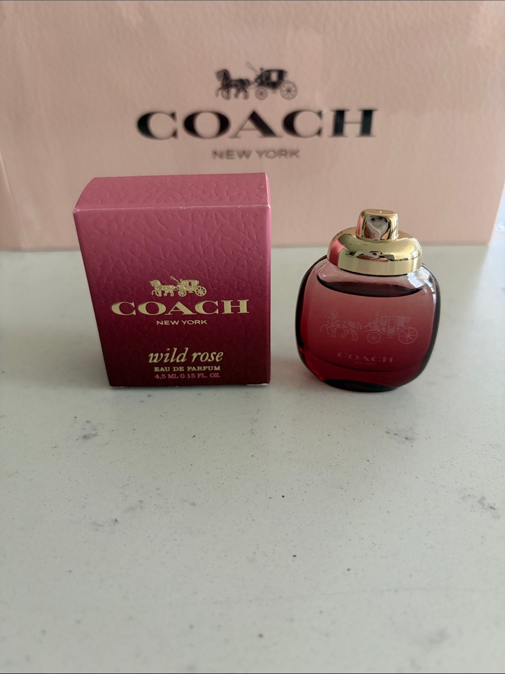 Coach Wild Rose